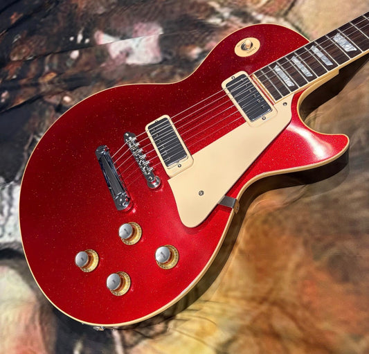 FANCY 💃! 2026 Gibson Custom Shop '76 Les Paul Deluxe Reissue Rocket Red Sparkle Top VOS Limited Edition LE 1976 Standard Norlin Era Mini Humbuckers Maple Neck Sandwich Body Construction ABR-1 Bridge Chrome Hardware Cream Plastics Brown Walnut Body